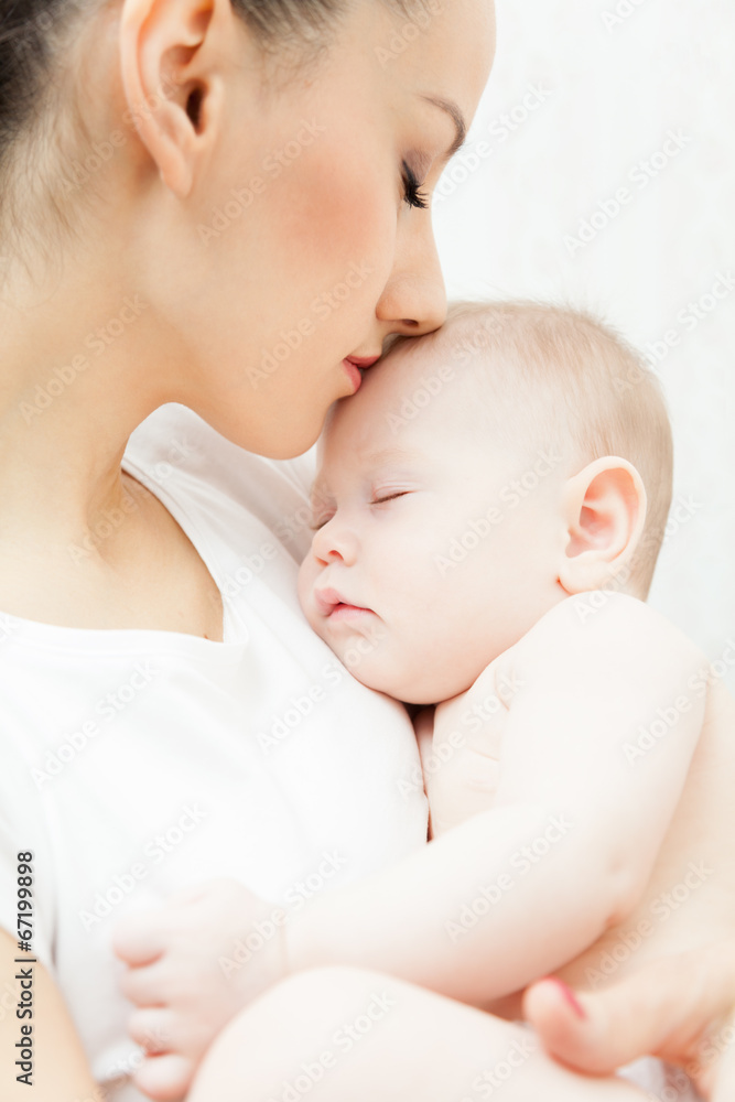 Mother hold little baby girl