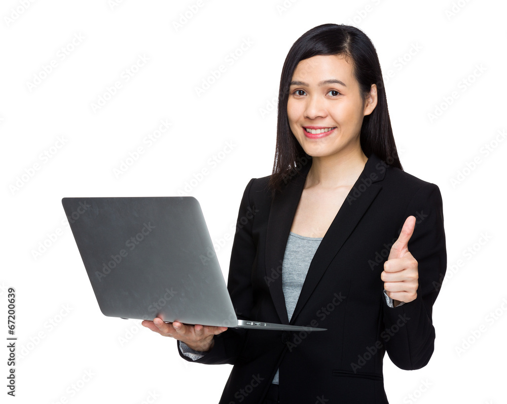 Asian business woman with laptop computer and thumb up Asian business woman with laptop computer and thumb up