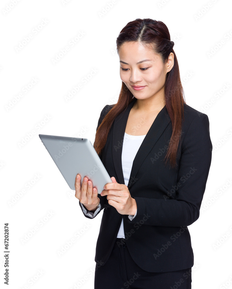 Business woman look at digital tablet Business woman look at digital tablet