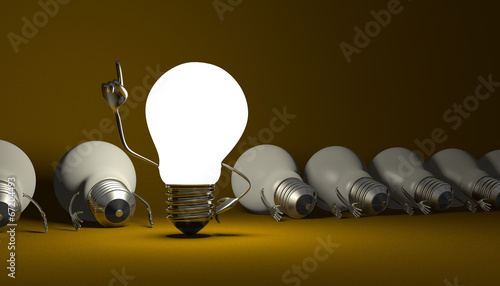 Light bulb character, aha moment  on yellow photo