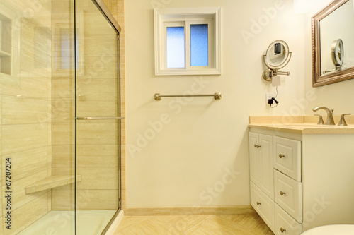 Bathroom interior with glass door shower