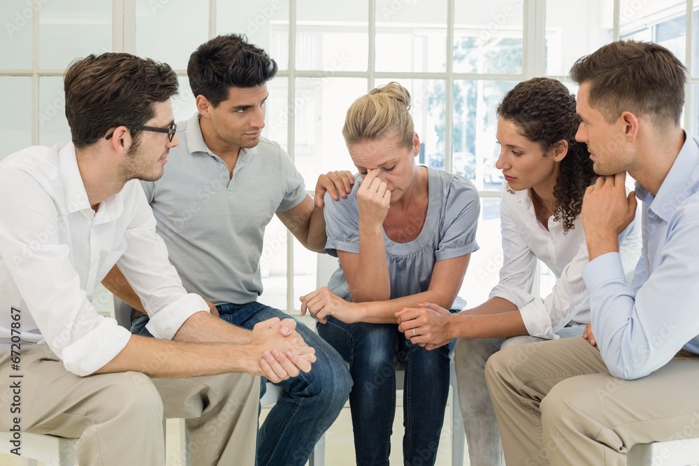 Group therapy in session sitting in a circle Group therapy in session sitting in a circle