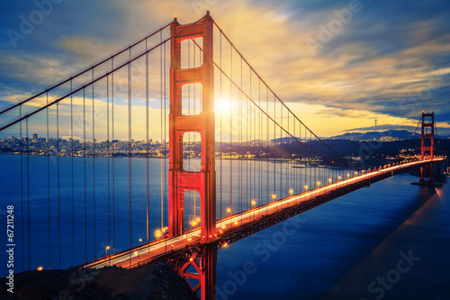 Famous Golden Gate Bridge at sunrise #67211248