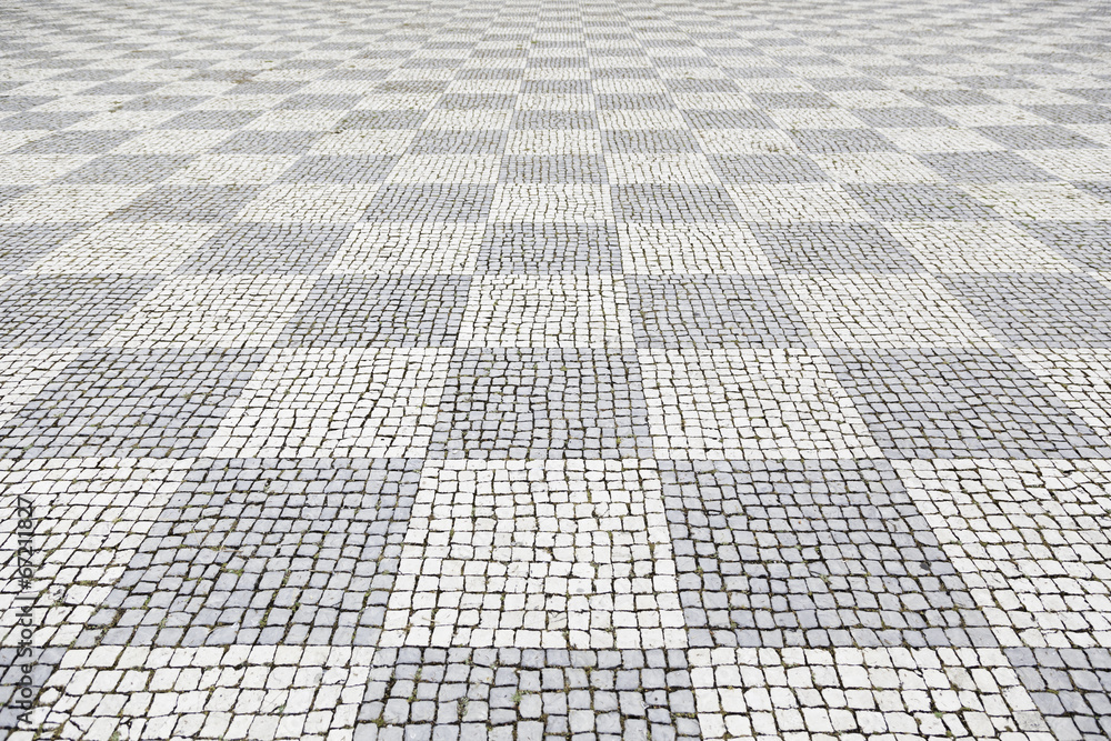 Fototapeta premium Typical stone floor of Lisbon