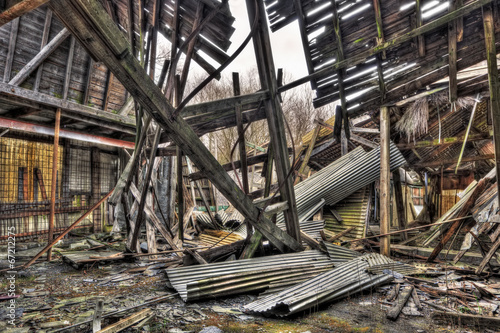 Collapsed roof of tumbledown warehouse
