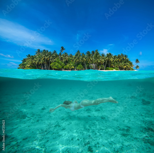 Woman snorkeling in a tropical lagoon