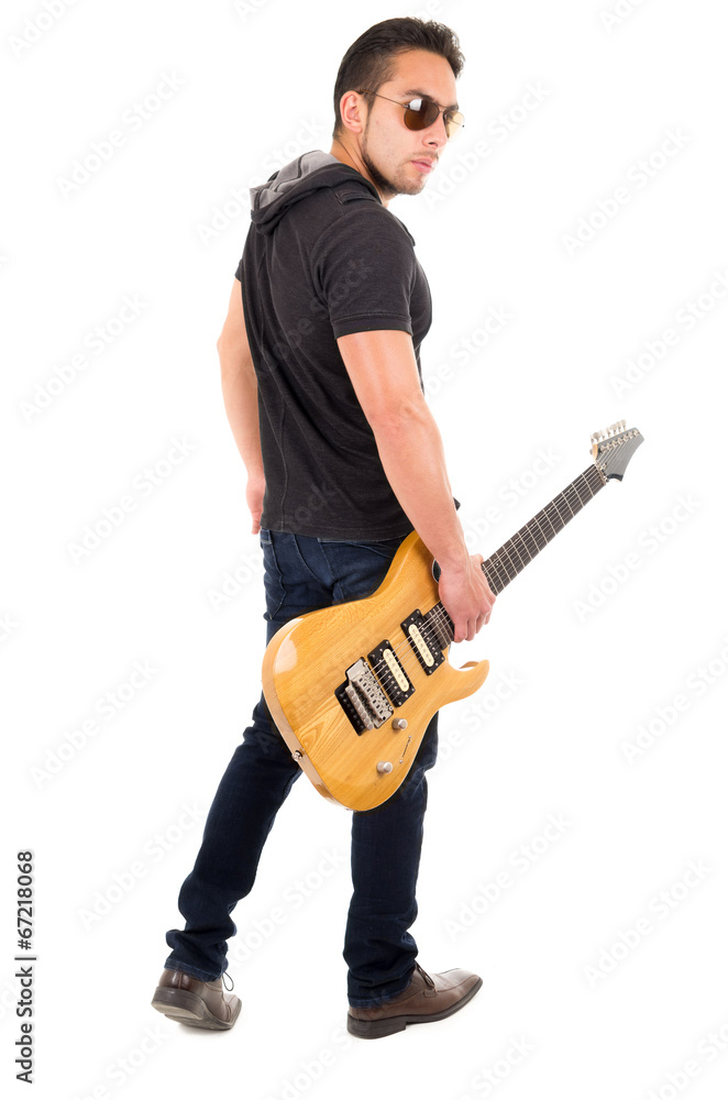 Naklejka premium young guy holding electric guitar