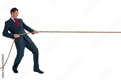 businessman pulling a rope