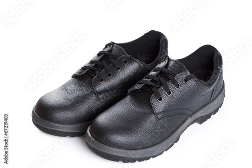 Black work boots on white background