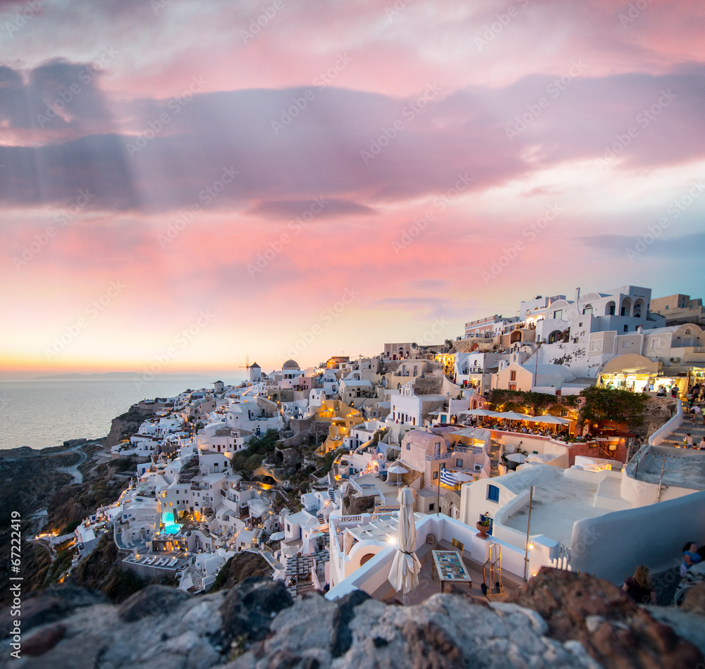 Mediterranean village of Oia at dusk, Santorini Island - Greece - obrazy, fototapety, plakaty 
