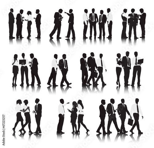 Silhouettes of Business People in a Row Working