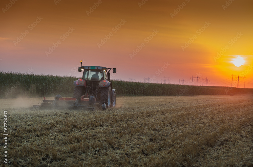 Fototapeta premium tractor plowing