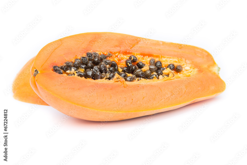 Half of papaya fruit isolated on white with clipping path Half of papaya fruit isolated on white with clipping path