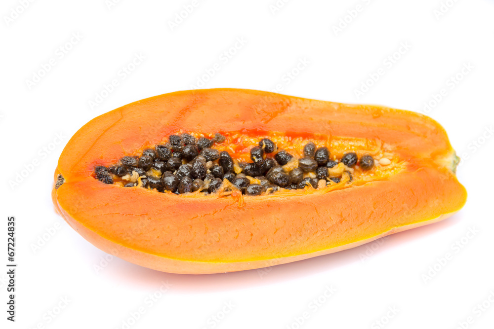 Half of papaya fruit isolated on white with clipping path Half of papaya fruit isolated on white with clipping path