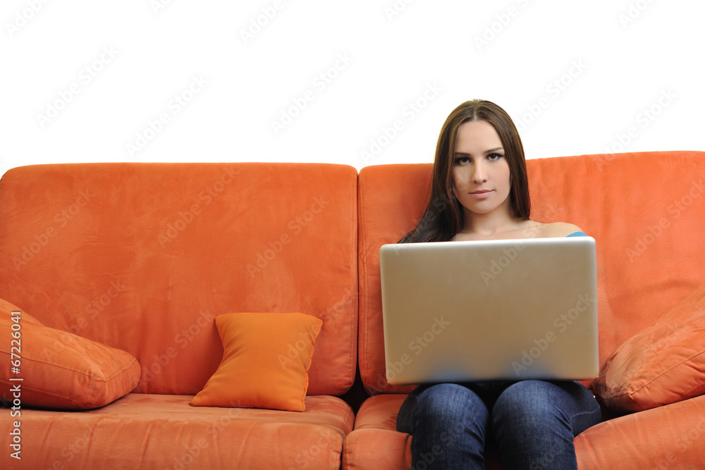 woman using a laptop computer at home woman using a laptop computer at home