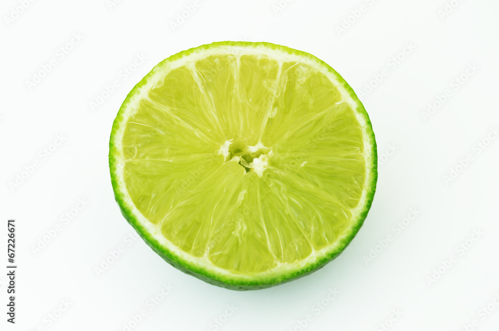 Citrus lime fruit half isolated on white background