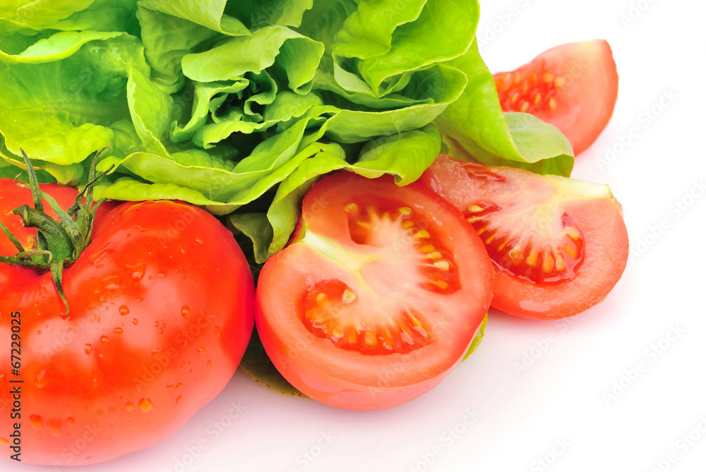 Fresh tomatoes and green salad isolated on white background Fresh tomatoes and green salad isolated on white background