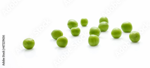 Scattered green peas closeup