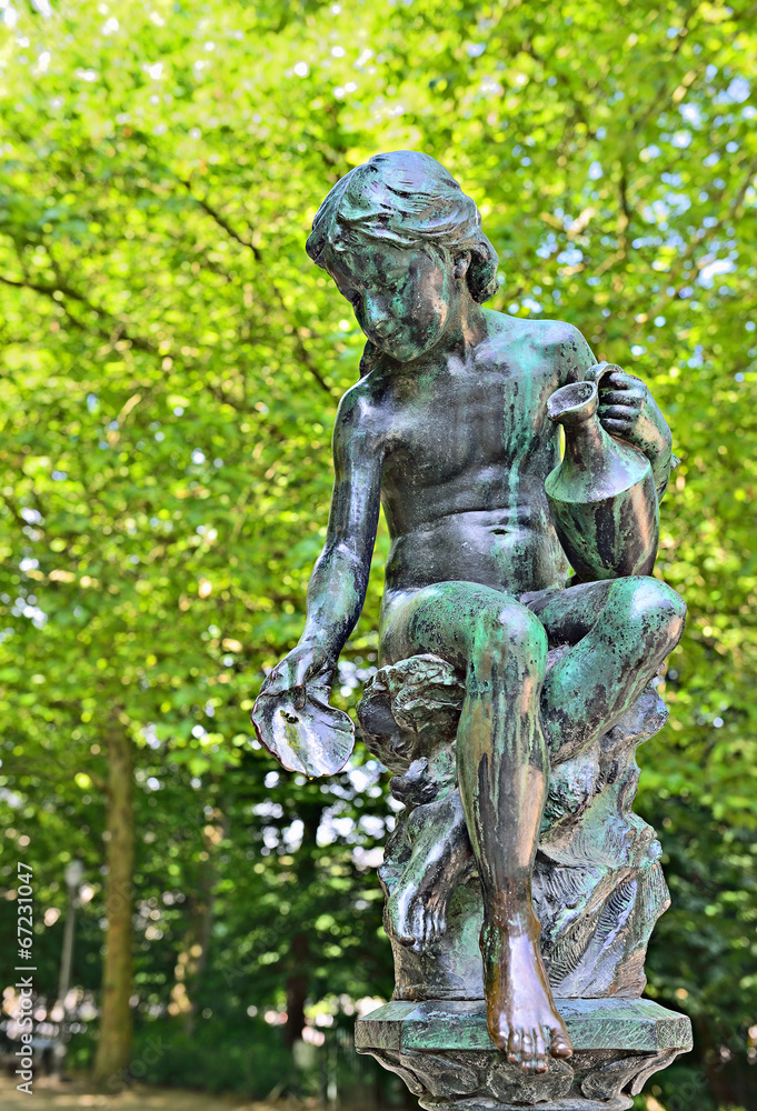 Statue of 19 century in city parc in Brussels
