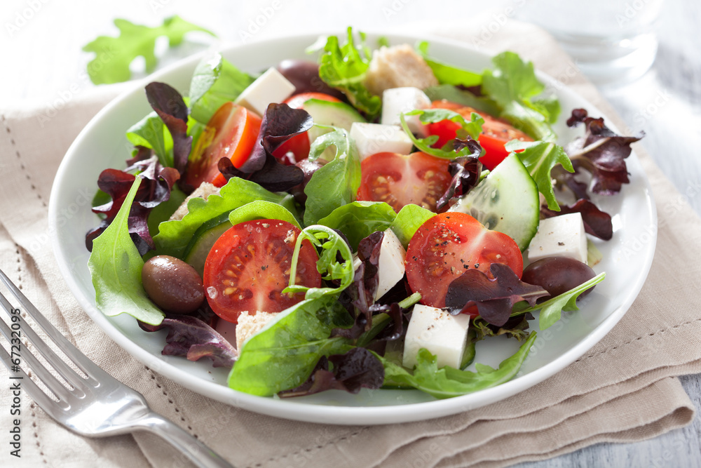 healthy salad with tomatoes olives and feta cheese