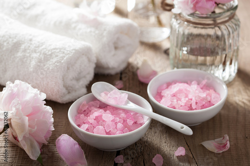 spa set with peony flowers and pink herbal salt