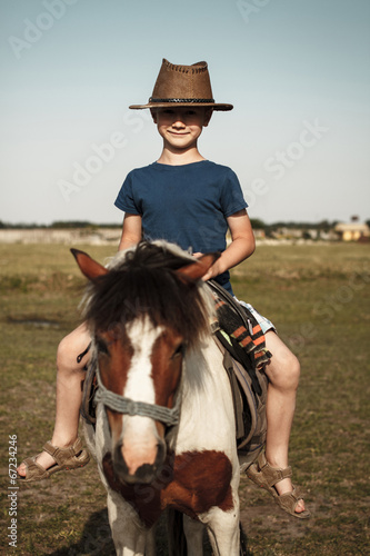 Konstfotografi Little kid with pony
