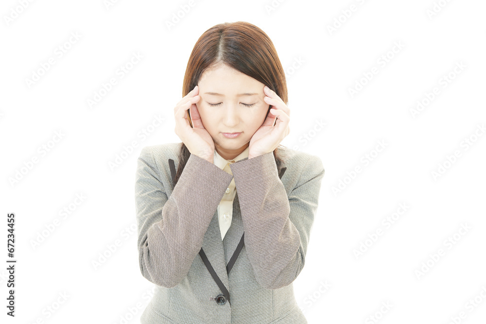 頭痛に悩むOL 頭痛に悩むOL