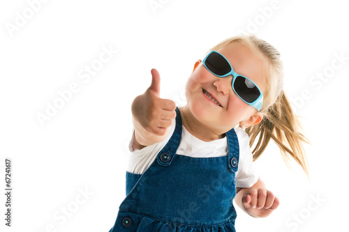 Little girl showing thumbs up
