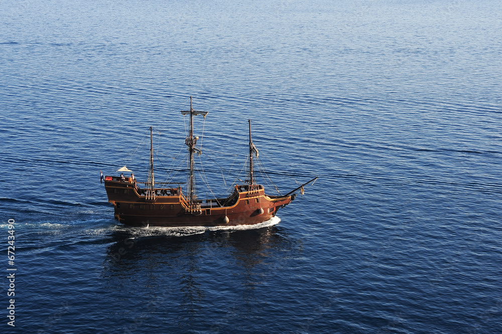Naklejka premium Old sailing boat on che coast of Dubrivnik