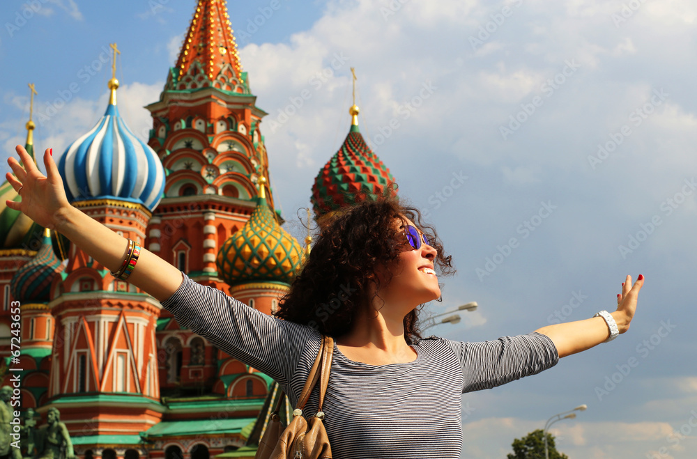 © Zarya Maxim - Beautiful woman in red square, Moscow, Russia