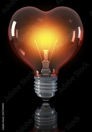Klassische Glühlampe in Herzform, schwarzer Hintergrund
