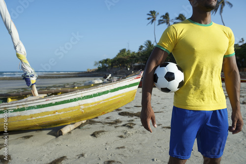 Brazilian Football Player Holding Soccer Ball Nordeste Beach photo