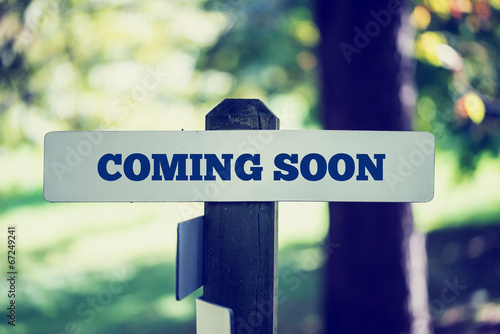 Принти на полотні Rustic signboard with the words Coming Soon