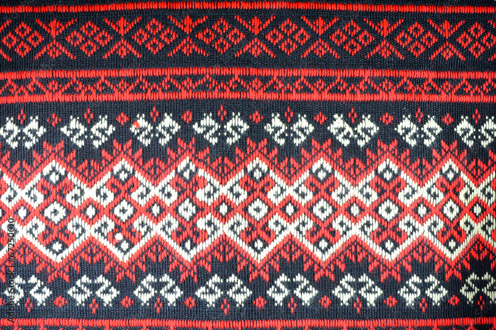 Hand-woven cloth in traditional Thai pattern