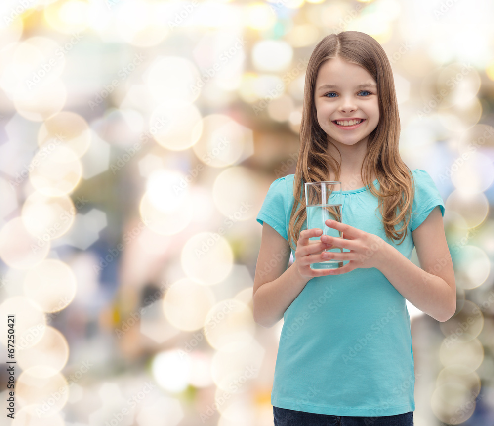 smiling little girl with glass of water smiling little girl with glass of water