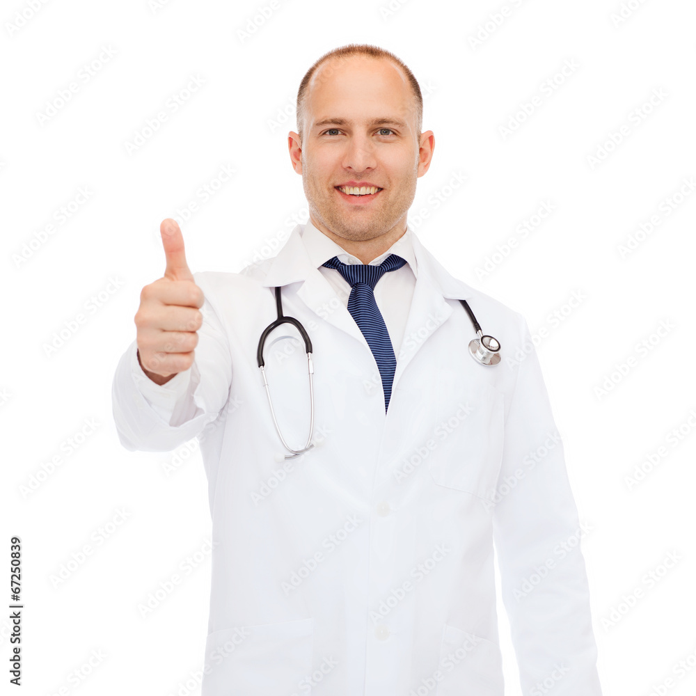 smiling doctor with stethoscope showing thumbs up smiling doctor with stethoscope showing thumbs up