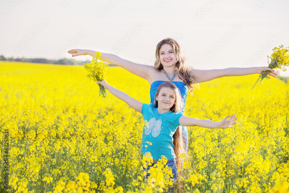 Happy family in spring field Happy family in spring field