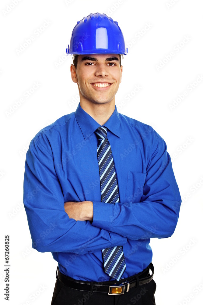 Young smiling businessman in a protective helmet Young smiling businessman in a protective helmet