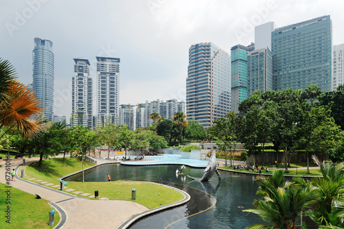 City park with modern buildings in Downtown of Kuala Lumpur