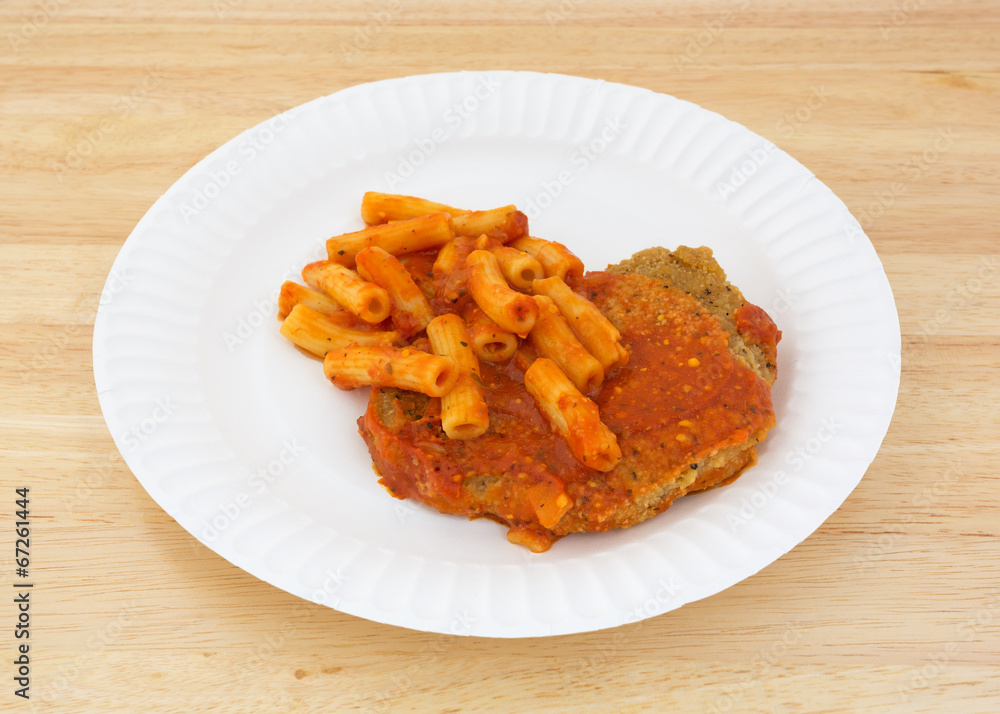 Breaded chicken with pasta in tomato sauce Breaded chicken with pasta in tomato sauce