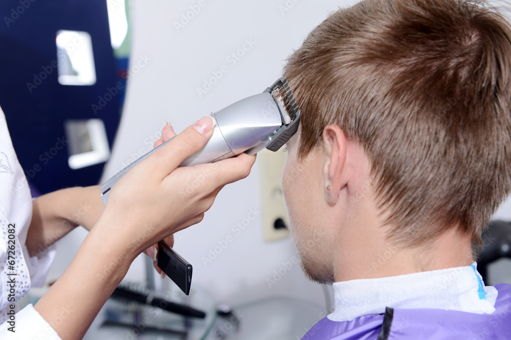 Fototapeta premium Young man in beauty salon