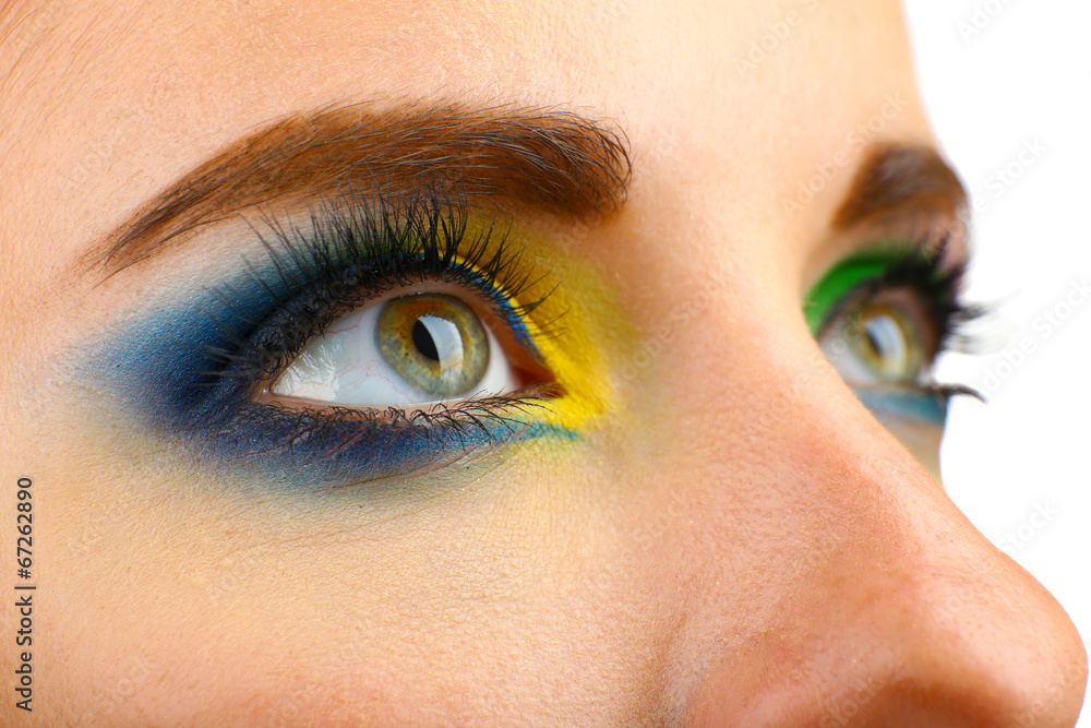 Naklejka premium Beautiful eyes with bright make-up, close up