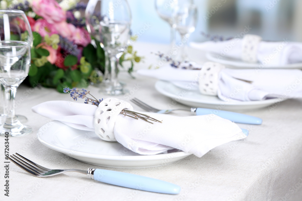 Dining table setting with lavender flowers Dining table setting with lavender flowers