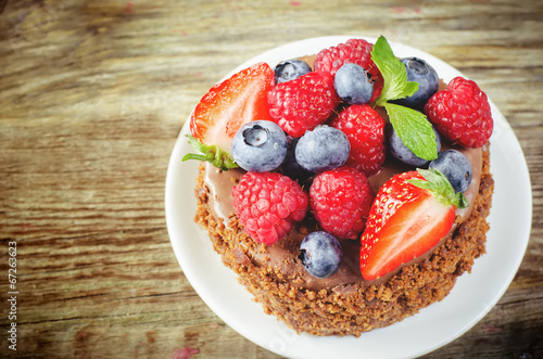 chocolate cake with raspberries  blueberries and strawberries