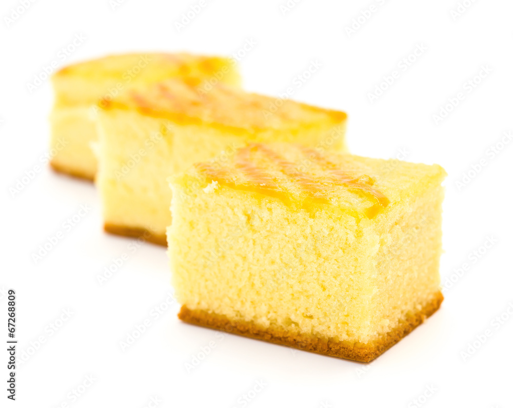 three pieces of sponge cakes on a white background