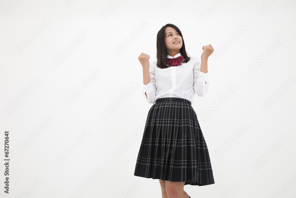 Fototapeta premium ガッツポーズをする高校生