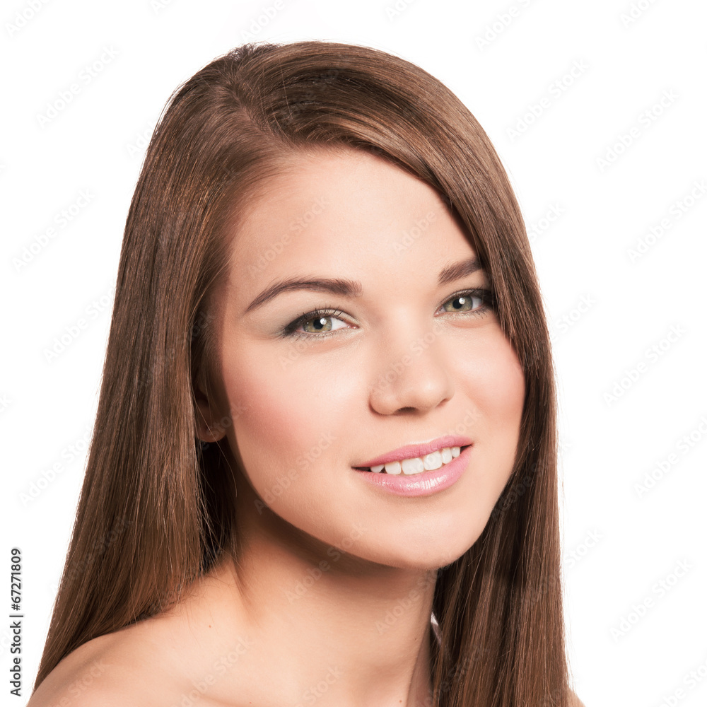 Cute young woman with long healthy brown hair. Natural look. Cute young woman with long healthy brown hair. Natural look.