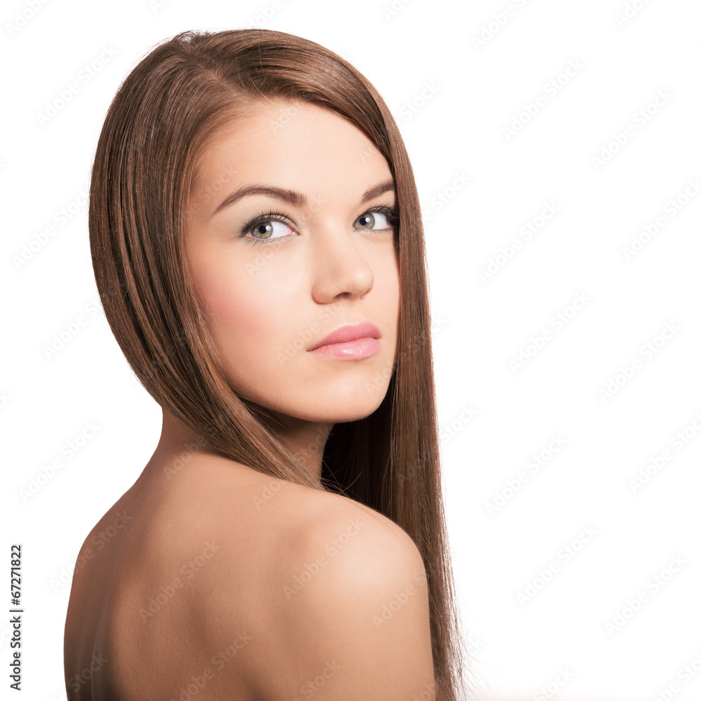 Obraz premium Cute young woman with long healthy brown hair. Natural look.