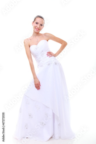 Wedding day. Romantic bride in white dress isolated