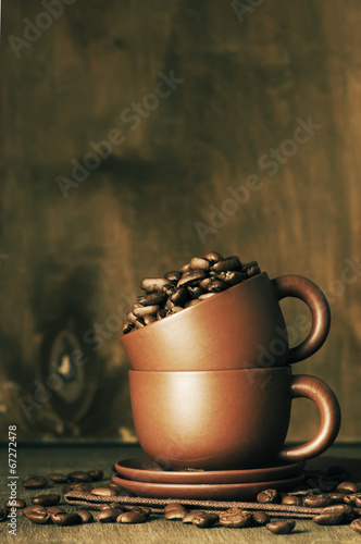 Coffee beans in cup